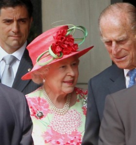 Queen Elizabeth II and Prince Philip, Duke of Edinburgh leaving the Royal York hotel in Toronto on a tour of Canada in 2010. 