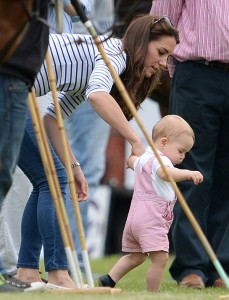 Prince George and the Duchess of Cambridge at the polo match. Photo credit: Splash news